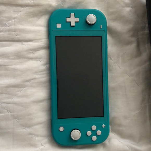 Nintendo Switch Lite with 3 games, 3 characters for Animal Crossing, and case.